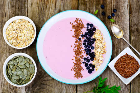 Smoothie with Blueberries, Oatmeal on Brown Boards Studio Photoの写真素材