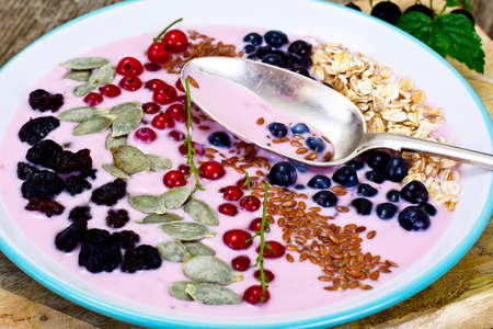 Smoothie with Blueberries, Oatmeal on Brown Boards Studio Photoの写真素材