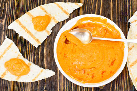 Hummus with Curry, Turmeric, Raw Chickpeas on the Boards Studio Photoの写真素材