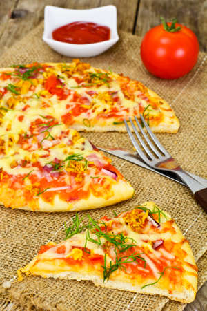 Pizza with Mushroom, Cheese, Mozzarella, Olives and Basil Studio Photoの写真素材