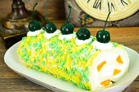 Sponge Roulade with Cream, Mandarin and Cherry Studio Photoの写真素材