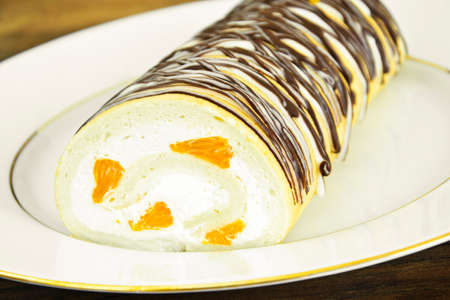 Sponge Roulade with Cream, Mandarin and Cherry Studio Photoの写真素材
