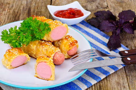 Grilled Sausage in Pastry with Sesame Seeds Stuidio Photoの写真素材
