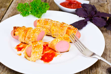 Grilled Sausage in Pastry with Sesame Seeds Stuidio Photoの写真素材