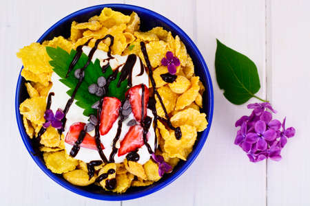 Cornflakes with Strawberry and Chocolate. Healthy Breakfast Studio Photoの写真素材