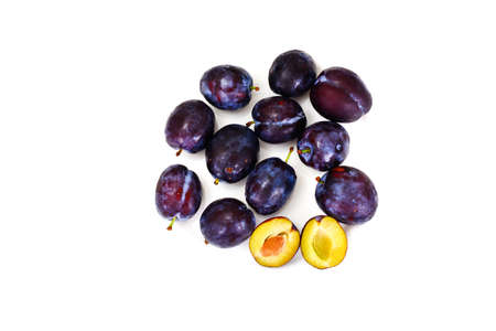 Juicy Ripe Plums on White Background Studio Photoの写真素材