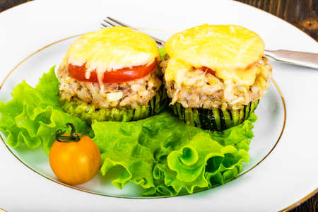 Zucchini with Tuna, Rice, Cheese and Tomato on Barbecue Grill Studio Photoの写真素材