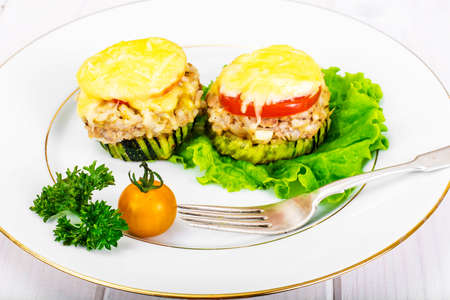 Zucchini with Tuna, Rice, Cheese and Tomato on Barbecue Grill Studio Photoの写真素材