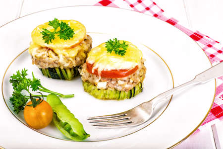 Zucchini with Tuna, Rice, Cheese and Tomato on Barbecue Grill Studio Photoの写真素材
