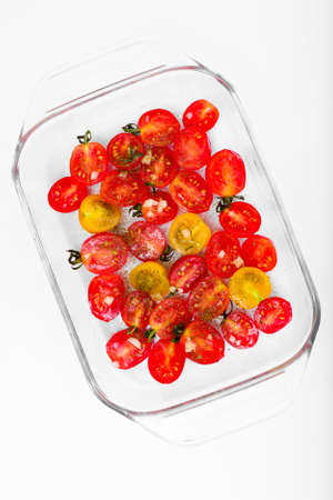Cherry Tomato Grill  with Olive Oil, Garlic, Oregano and Basil Studio Photoの写真素材