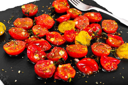 Cherry Tomato Grill  with Olive Oil, Garlic, Oregano and Basil Studio Photoの写真素材
