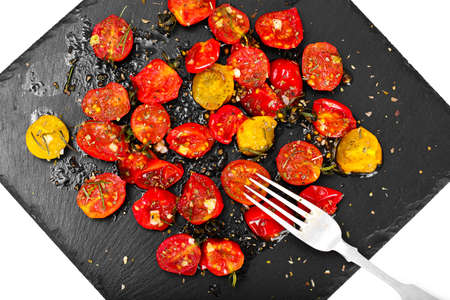 Cherry Tomato Grill  with Olive Oil, Garlic, Oregano and Basil Studio Photoの写真素材