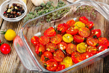 Cherry Tomato Grill  with Olive Oil, Garlic, Oregano and Basil Studio Photoの写真素材