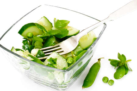 Salad with Cucumber, Purslane and Green Peas on Dark Disks Studio Photoの写真素材