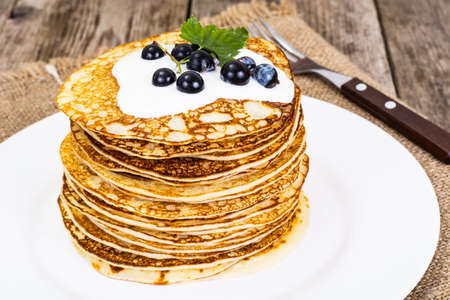 Tasty Pancakes with Black Currant Stack Studio Photoの写真素材