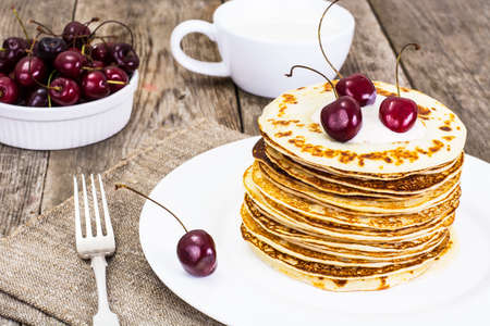 Tasty Pancakes with Cherry Stack Studio Photoの写真素材
