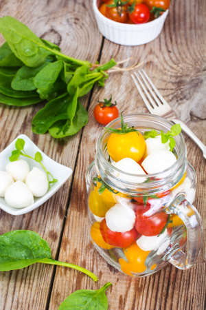 Caprese Salad in Glass Jar Studio Photoの写真素材