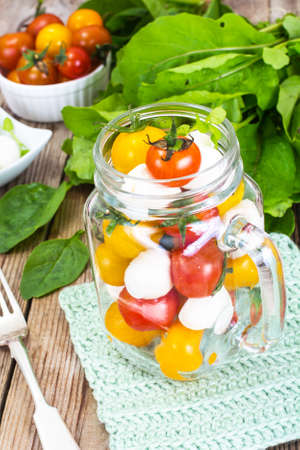 Caprese Salad in Glass Jar Studio Photoの写真素材