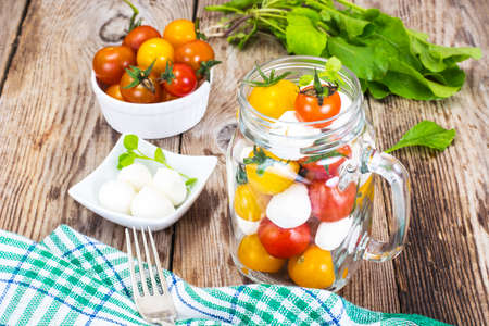 Caprese Salad in Glass Jar Studio Photoの写真素材