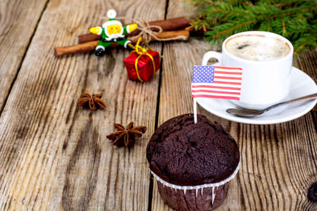 Chocolate Muffin with Coffee and the American Flag Studio Photoの写真素材