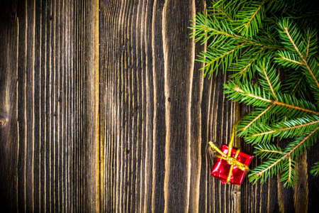 Abstract Christmas and New Year Background with Old Vintage Wooden Boards, Fir Branches Studio Photoの写真素材