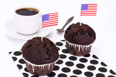 Chocolate Muffin, Black Coffee and American Flag on White Backgroundの写真素材