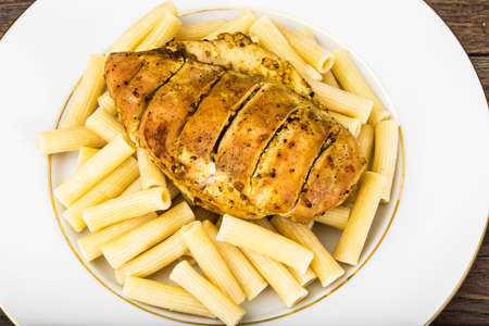 Grilled Chicken Fillet with Pasta Studio Photoの写真素材