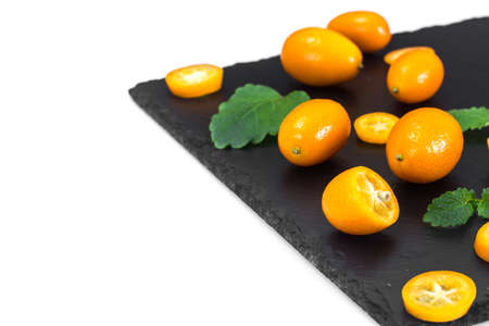 Fresh Orange Kumquats on White. Studio Photoの写真素材