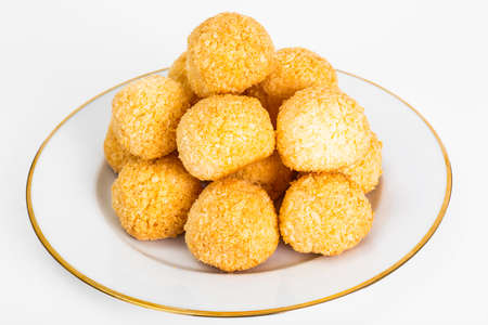 Delicate crumbly coconut biscuits on Plate. Studio Photo