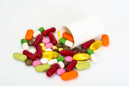 Color pills and medical bottle. Studio Photo