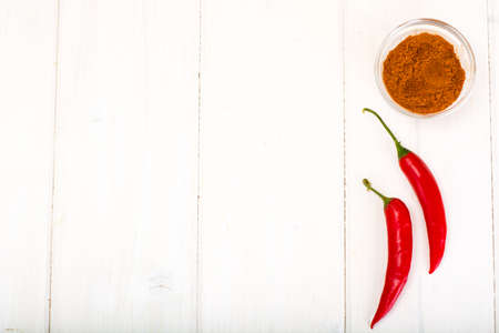 Red hot chilli peppers on White. Studio Photo