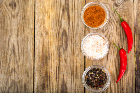 Red hot chilli peppers on wood. Studio Photoの写真素材