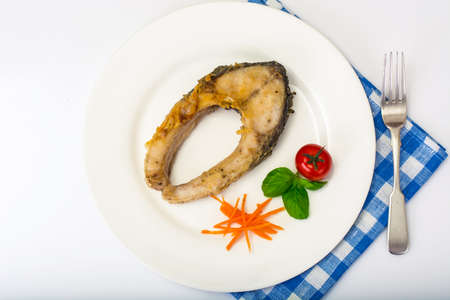 Fried breaded fish on a white background. Studio Photo