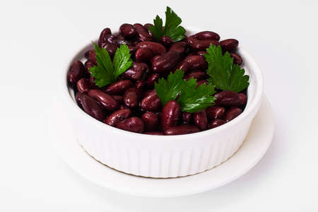Beans  in white salad bowl. Studio Photo