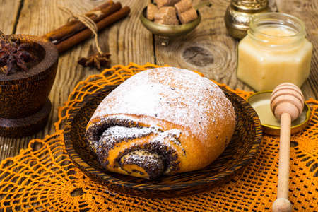 Buns with poppy seeds and icing sugar. Studio Photoの写真素材
