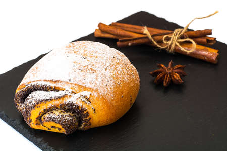 Buns with poppy seeds and icing sugar. Studio Photoの写真素材