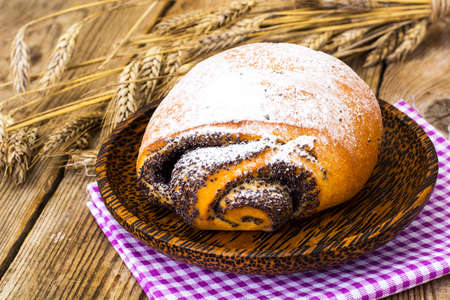 Buns with poppy seeds and icing sugar. Studio Photoの写真素材