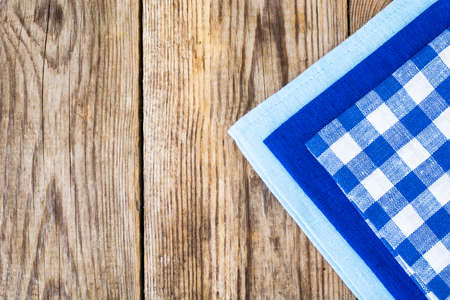Napkins for table on background of old boards. Studio Photo
