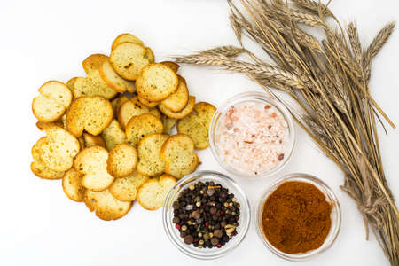 Fried slices of bread for bruschetta. Studio Photo