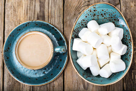 White marshmallow and coffee with milkの写真素材