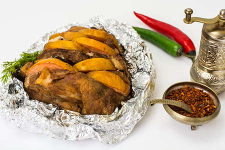 Baked meat with quince slicesの写真素材