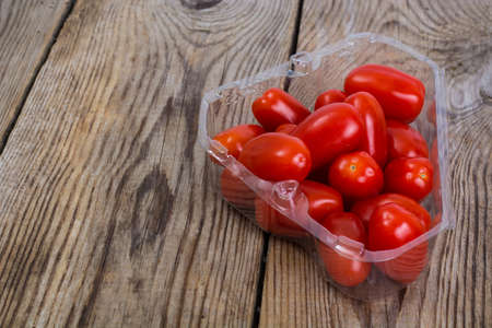 Small red oblong tomatoesの写真素材