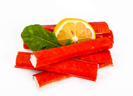 Crab sticks, lemon and arugulaの写真素材