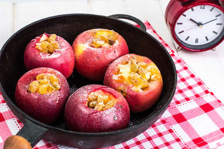 Apples cookies with raisins, honey and powdered sugarの写真素材