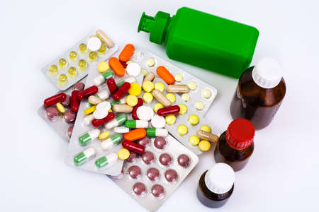 Medical bottles and foil blisters with the capsules and tabletsの写真素材