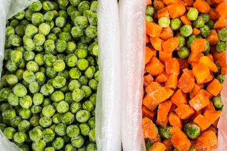 Frozen vegetables in plastic bagsの写真素材