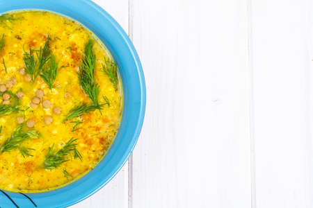 Pea soup with vegetables and dill on a white backgroundの写真素材