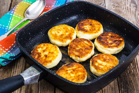 Cheesecakes fried on a grill panの写真素材