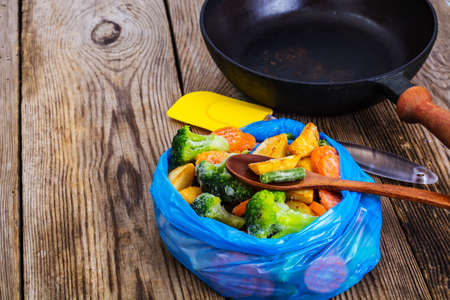 Frozen mixed vegetables in a blue bag. Studio Photoの写真素材