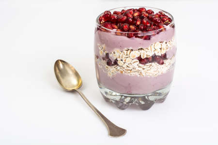 Muesli, yogurt, chia seeds, pomegranate seeds, honey, healthy breakfast. Studio Photoの写真素材
